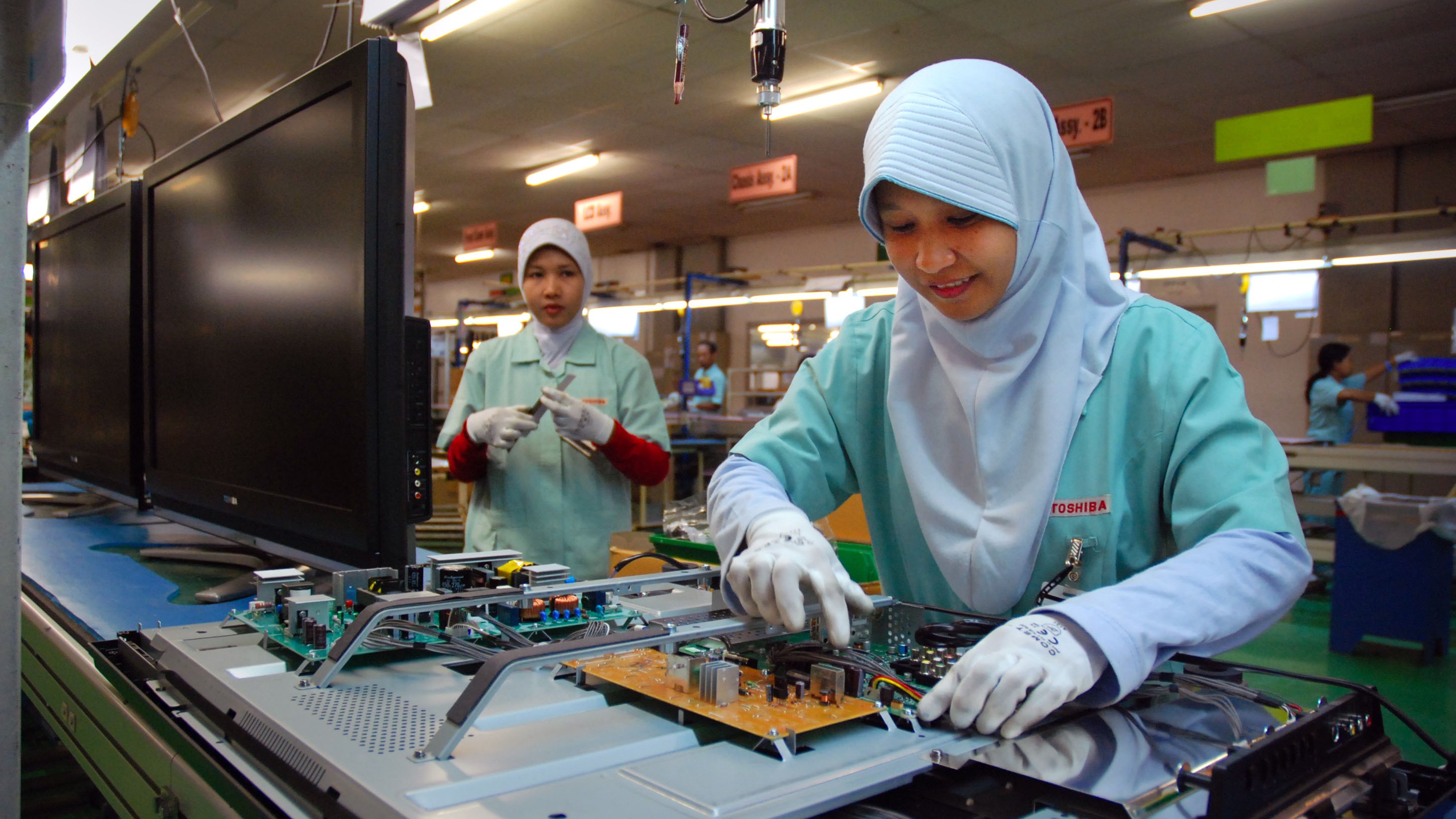 Workers manufacturing electronic goods, televisions Cikarang Indonesia.