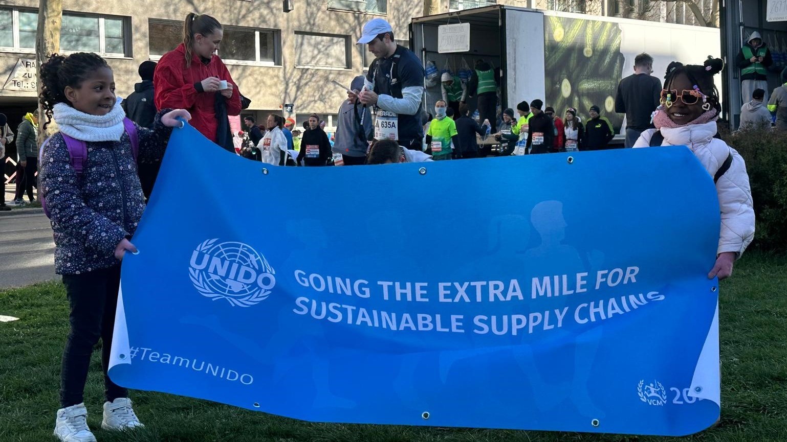 Cropped holding sign